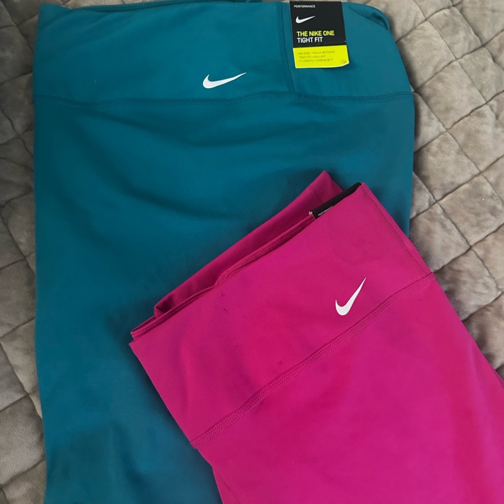 Two pairs of Nike one Women's tight fit shorts (TWO PAIRS)